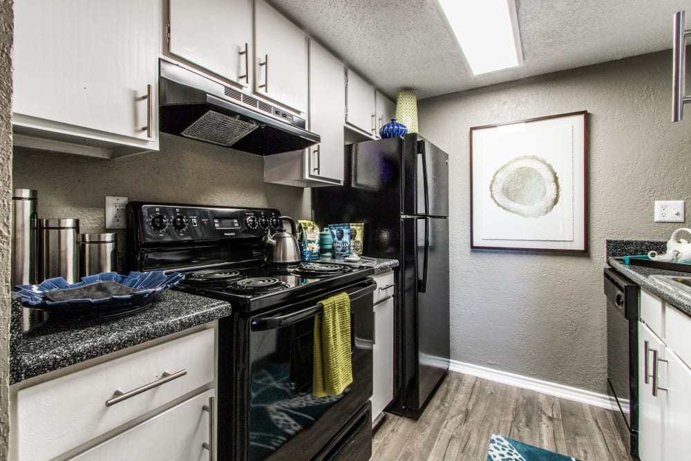Fully equipped model kitchen at Sundance Apartments in College Station, Texas