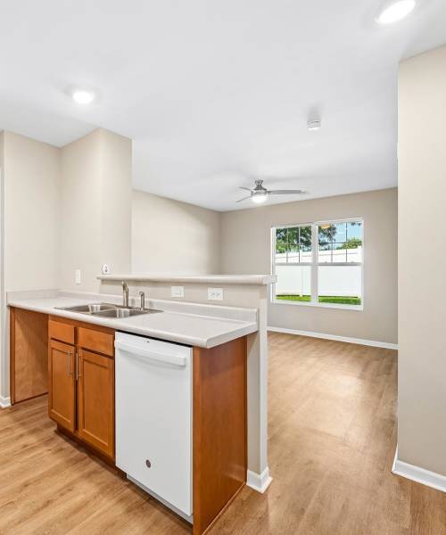 View of the kitchen and living room at Juniper Crossing I in Columbus, Ohio