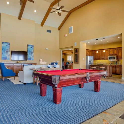 Game room with billiards at Oak Hollow, Seguin, Texas