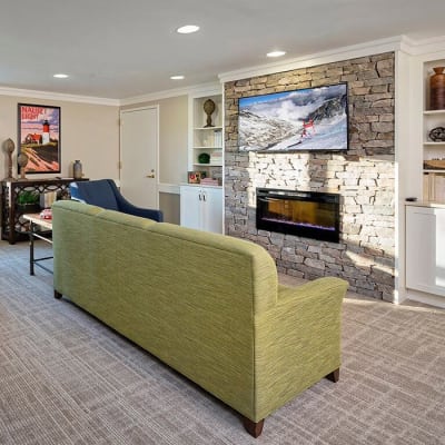 Living room at Maplewood at Mayflower Place in West Yarmouth, Massachusetts