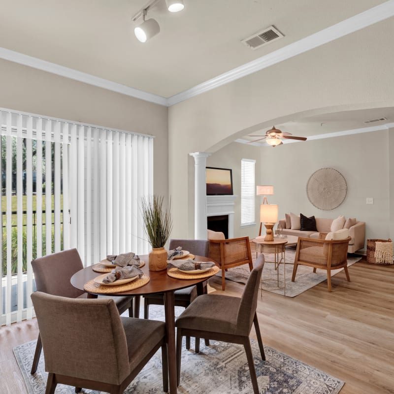 Dining room and Living room at The Estates of Northwoods in San Antonio, TX