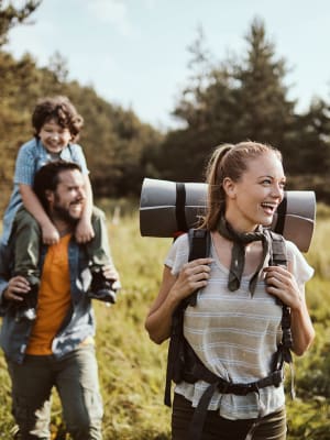 A family hiking near Strata Apartments in Denver, Colorado