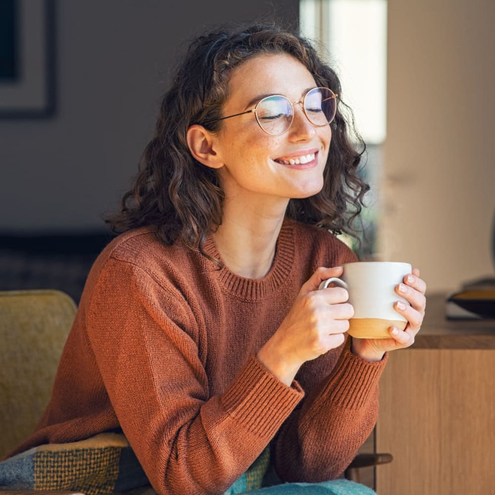 Resident enjoying her coffee at The Reserve at Rohnert Park in Rohnert Park, California