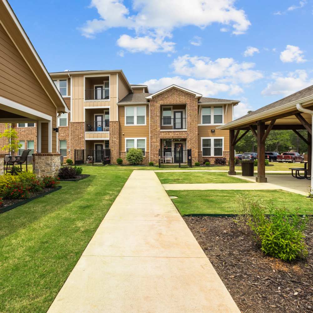 Exterior view with walkway at Harvest Creek in Marshall,Texas