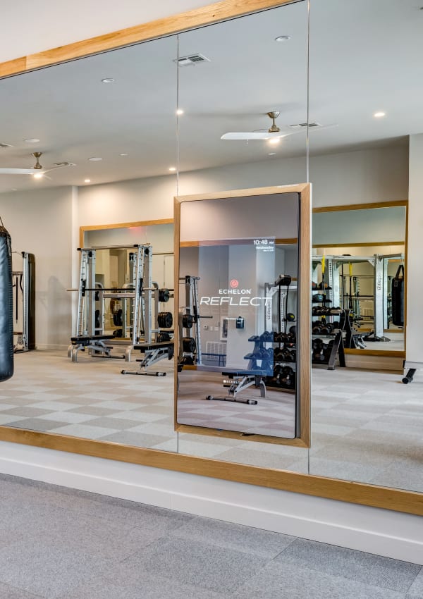 Fitness center with a smart workout mirror at 44 South in Austin, Texas