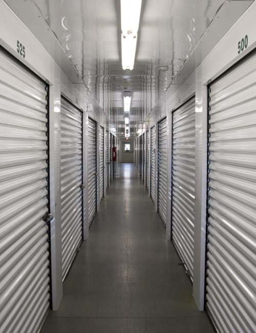 An inside hallway of storage units at Storage World in Sinking Spring, Pennsylvania