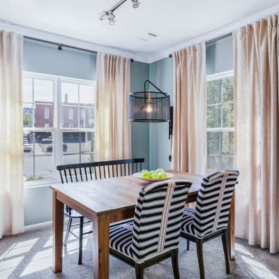 Nice cute dining area in a model home at Sofi at Salem Station in Salem, Massachusetts