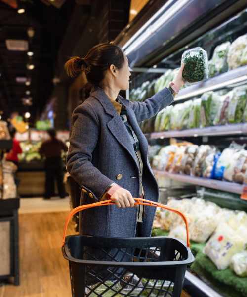 Woman buying groceries near Fletcher Black in Panama City, Florida