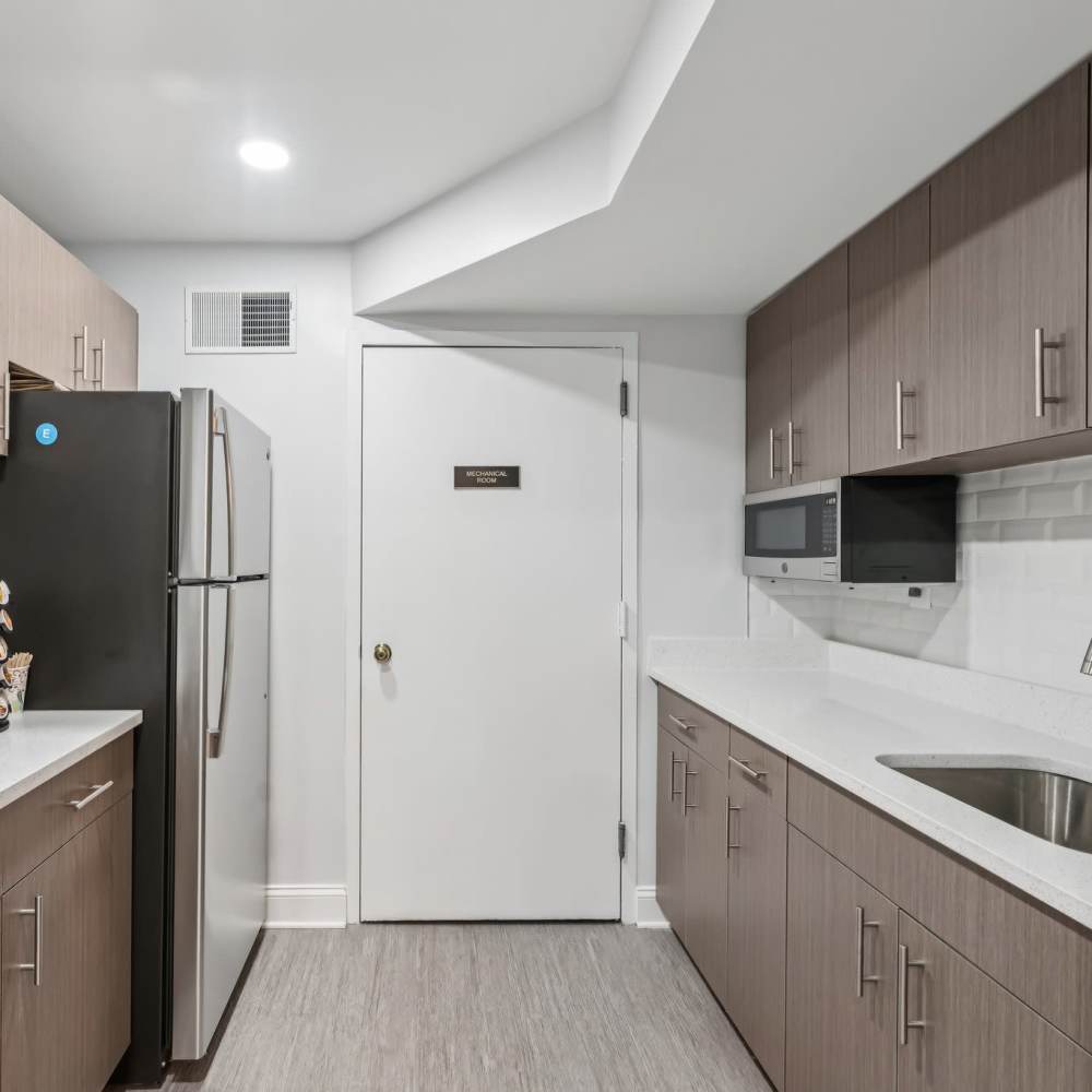 Community kitchen with modern appliances at Georgia West in Silver Spring, Maryland