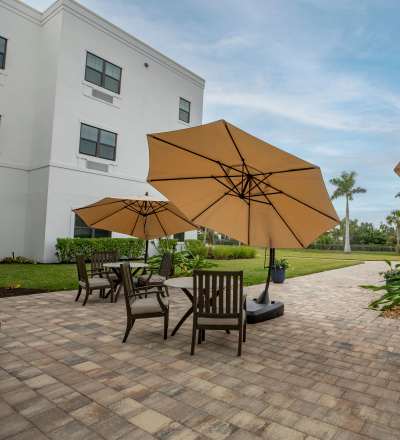 Outdoor seating area at Keystone Place at Beachwalk in Fort Myers, Florida