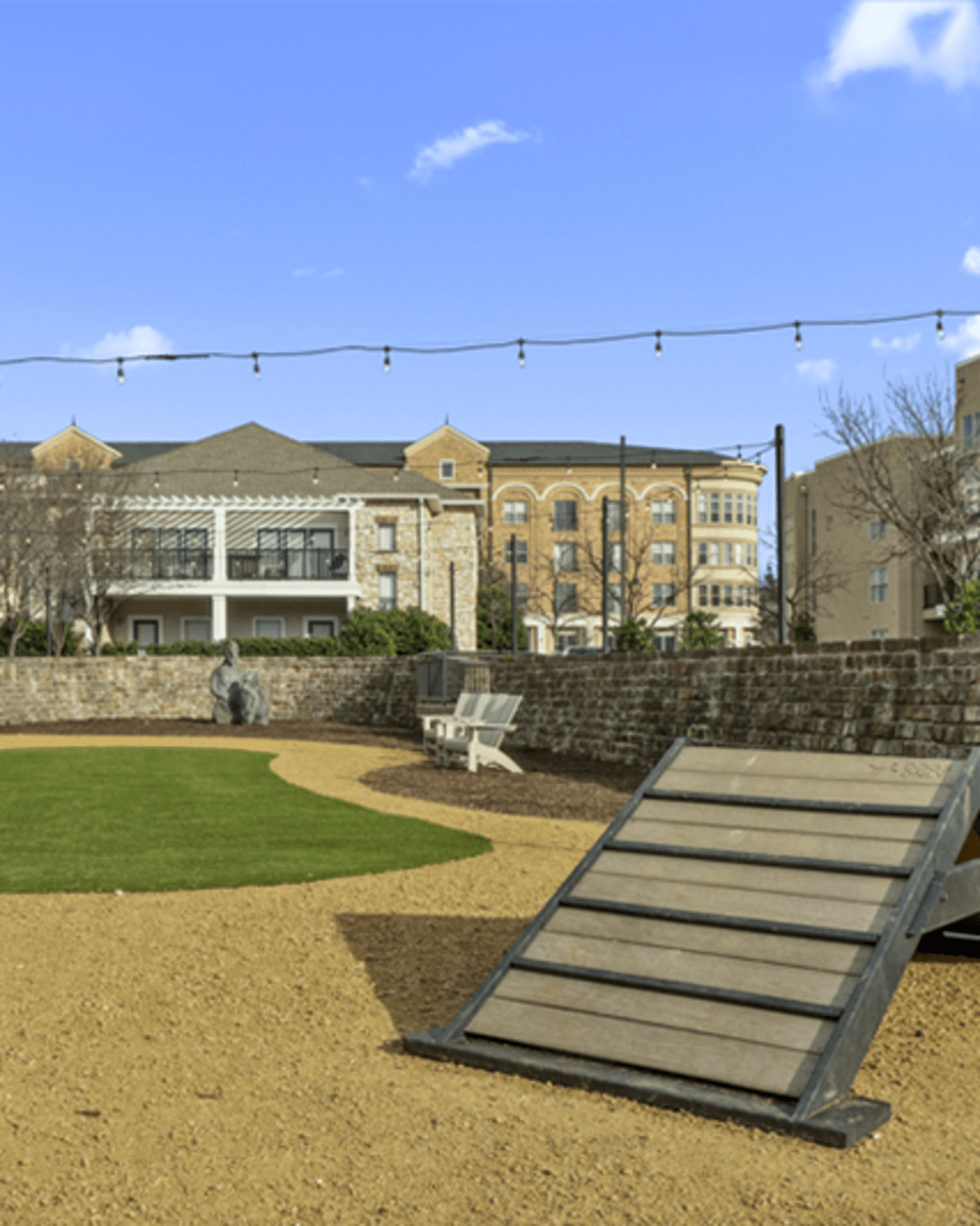 Dog park with agility course at Arbor Hills at Flatiron District at Austin Ranch in The Colony, Texas