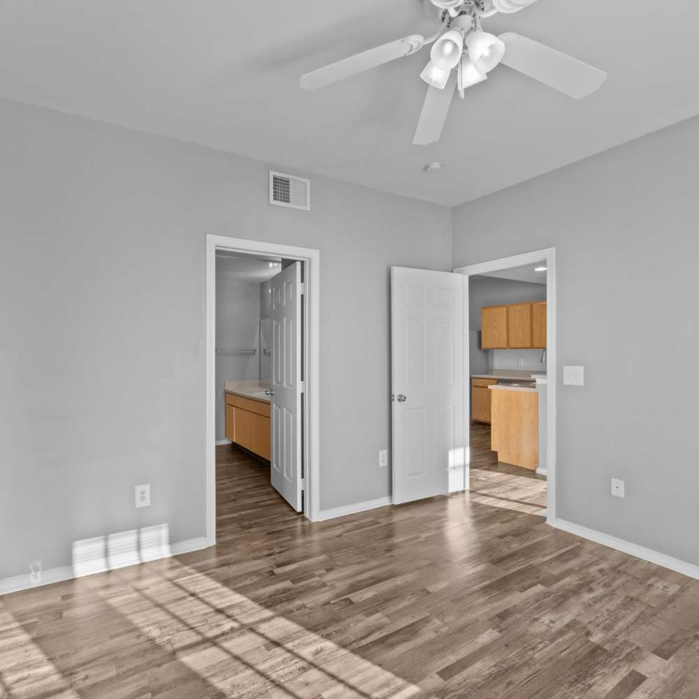 Unfurnished bedroom with connecting rooms at Burkburnett Residences in Burkburnett, Texas