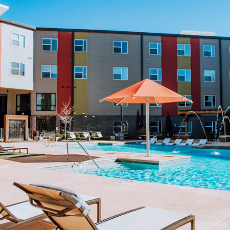 Exterior and sparkling pool of Terra at University North Park in the afternoon