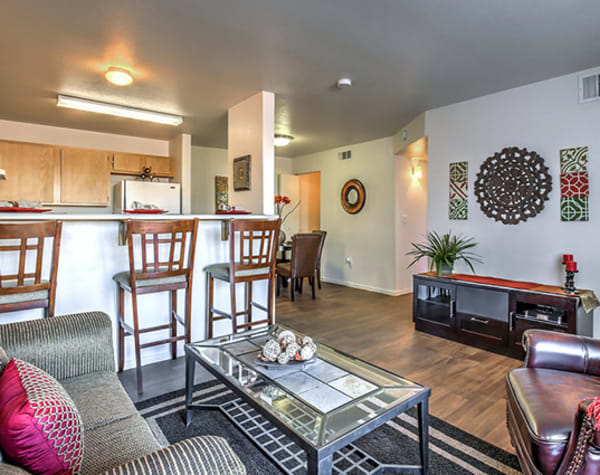 Model Living Room with View into Kitchen at Portola Del Sol in Las Vegas