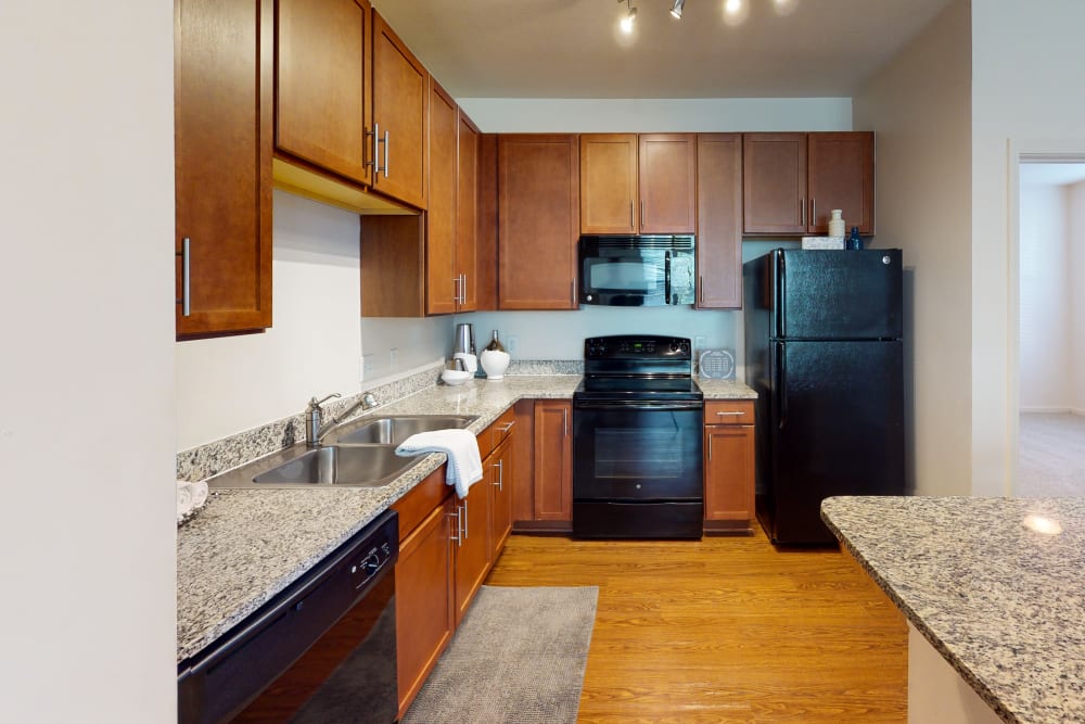 A kitchen with plenty of cabinet space in a model home at The Hawthorne in Jacksonville, Florida