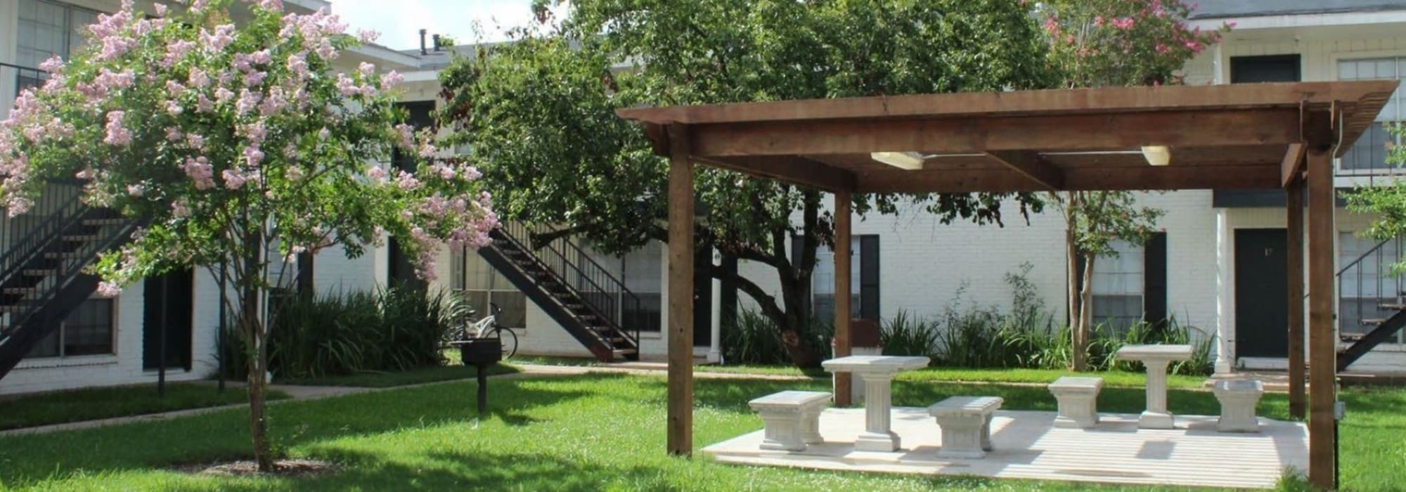Picnic tables at Midtown Manor and Towers in Bryan, Texas
