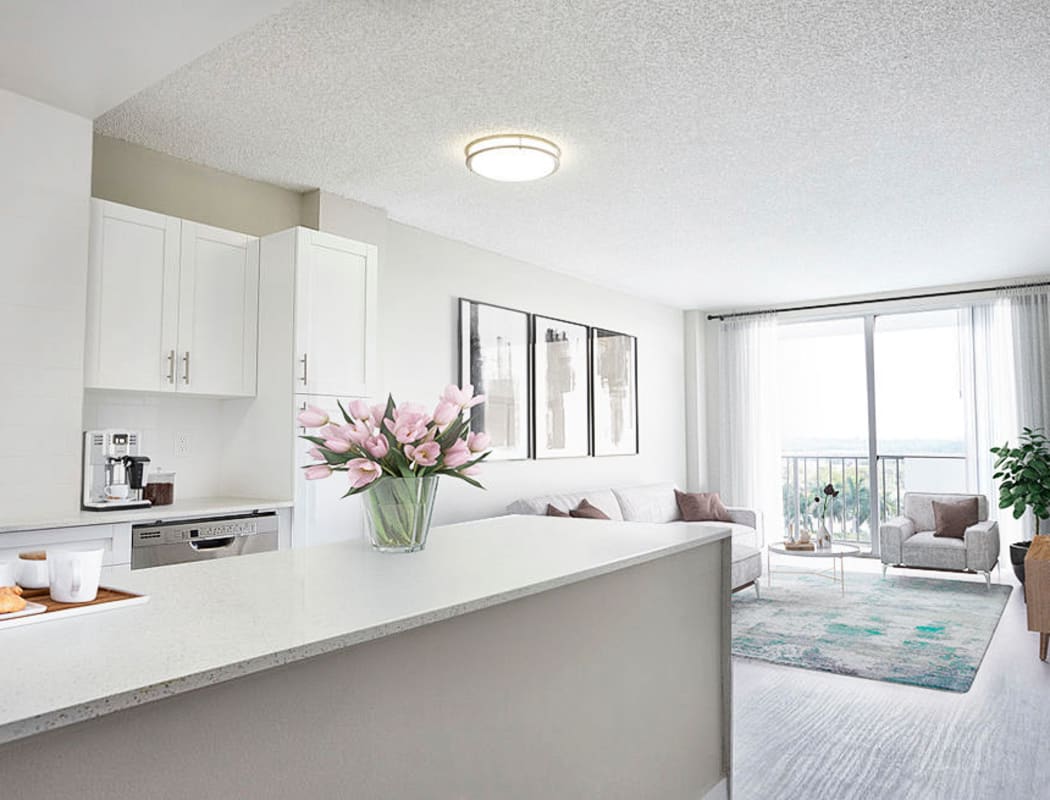 Open-concept floor plan with hardwood floors at Aliro in North Miami Beach, Florida