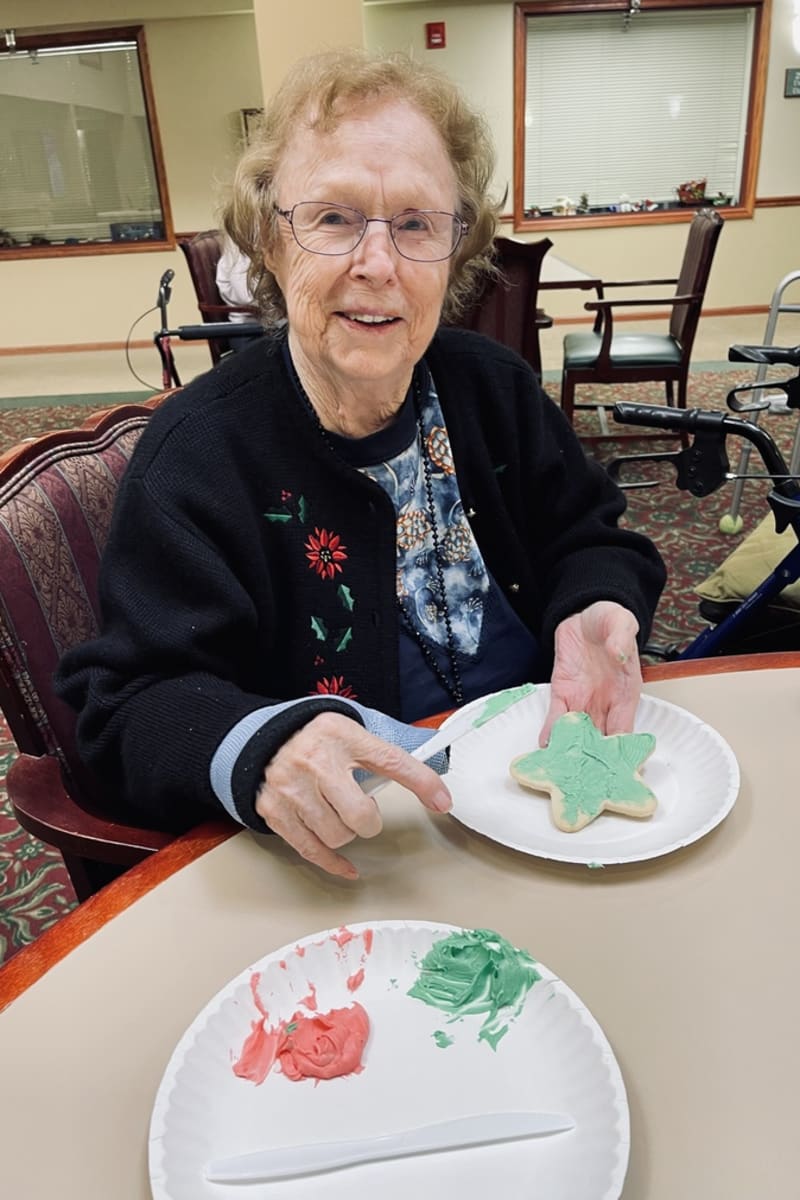 Resident with christmas cookies at Trustwell Living of Raytown in Raytown, Missouri