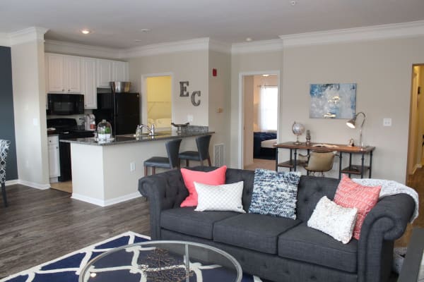 Living room and kitchen at Easton Commons Apartments & Townhomes in Columbus, Ohio