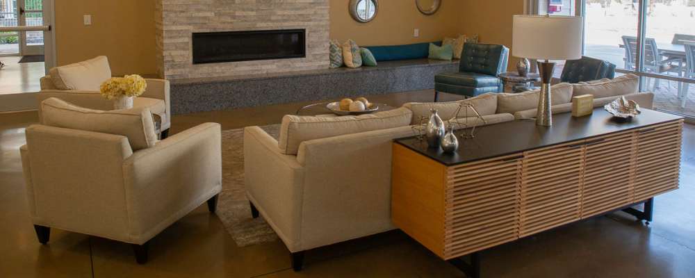 Sofa, chairs, console table with fire place