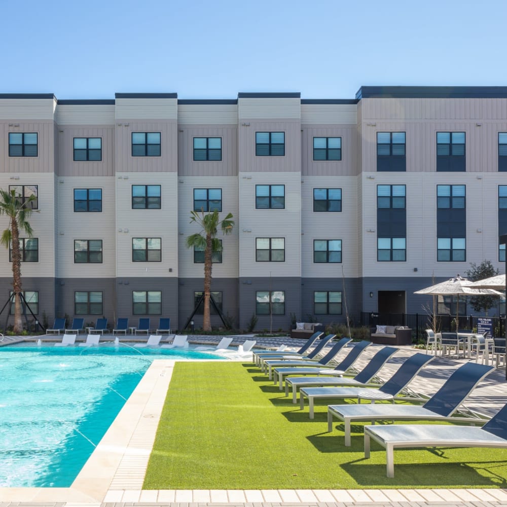 Large inground pool with lounge chairs at Bellrock Memorial in Houston, Texas