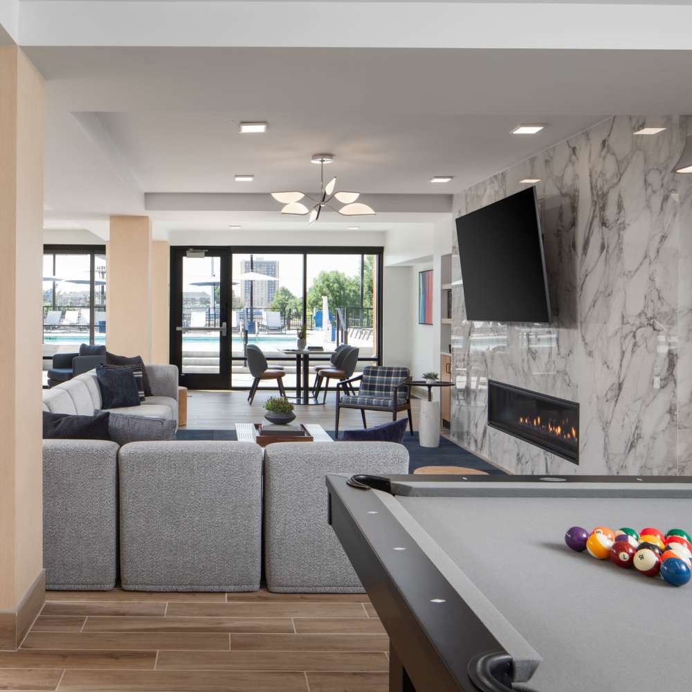 Clubhouse with pool table and television at Oaks Pentagon Village in Edina, Minnesota