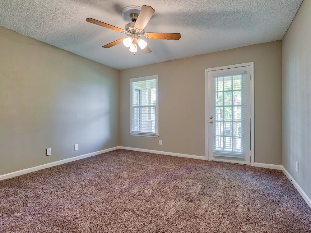 bedroom with ceiling fan at The Gatsby at Midtown Apartment Living in Montgomery, AL