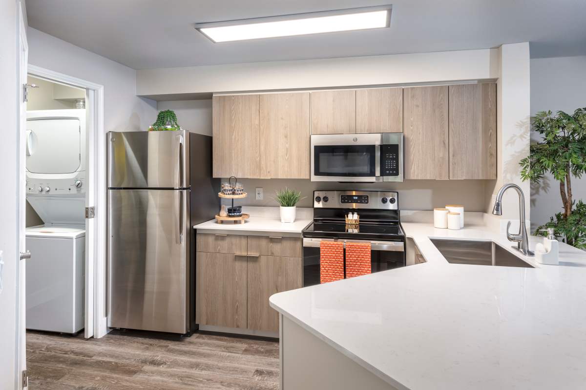 Model apartment kitchen at Redmond Place Apartments in Redmond, Washington