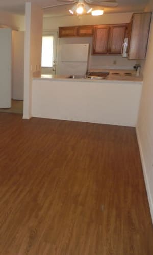 Kitchen sink overlooking the living room at Highland Oaks in Duncanville, Texas