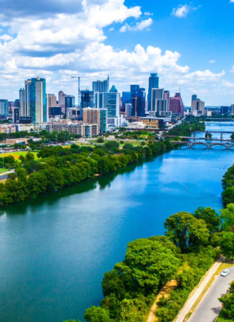 Skyline view of downtown along river in Austin, Texas from Marquis at Barton Trails