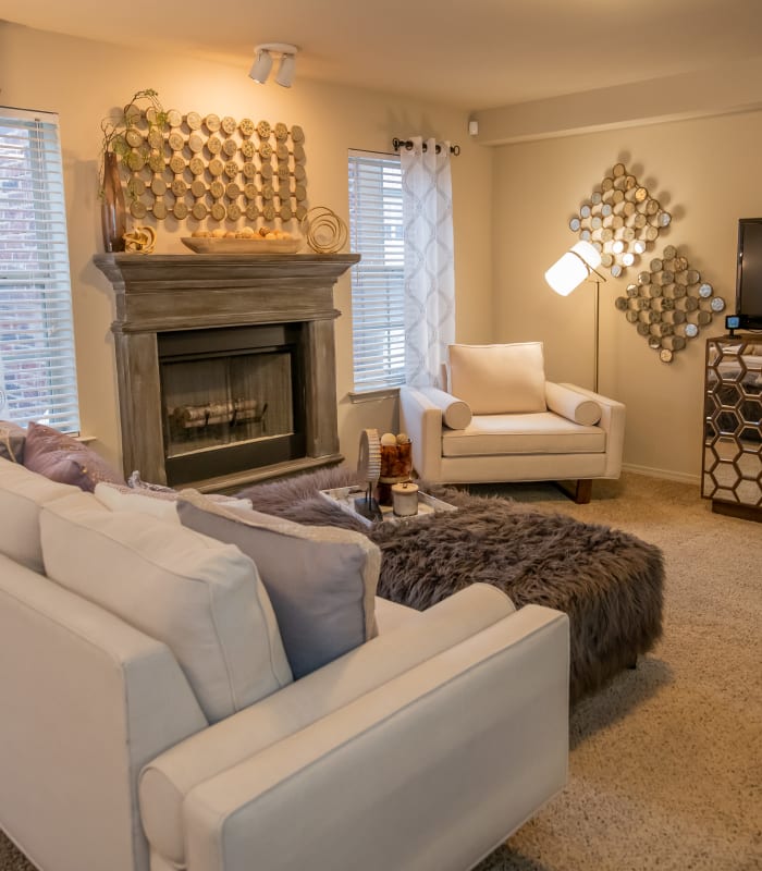 Spacious living room with large windows at Cascata Apartments in Tulsa, Oklahoma