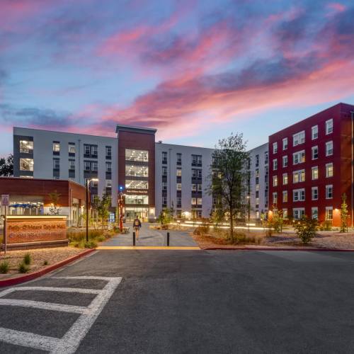Apartment buildings entrance night view at Polly O'Meara Doyle Hall in Santa Rosa, California