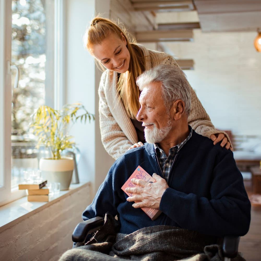 A resident and caregiver at The Ridge at Lansing in Lansing, Michigan