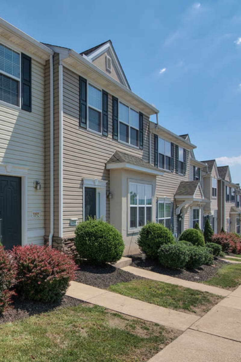 Exterior of Emerald Pointe Townhomes on a sunny spring day in Harrisburg, Pennsylvania