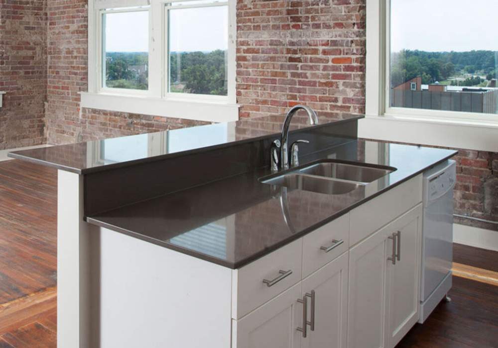 Modern Kitchen with countertop at  Hub City Lofts in Hattiesburg, Mississippi