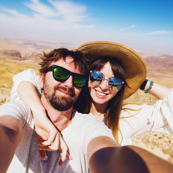 Resident couple taking selfie from near Olympus at Arroyo Verde in Tucson, Arizona