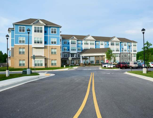 Exterior view of community building at Harmony at Waldorf in Waldorf, Maryland
