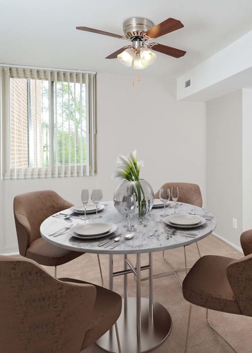 Dining room of a model home at Landmark Glenmont Station in Silver Spring, Maryland