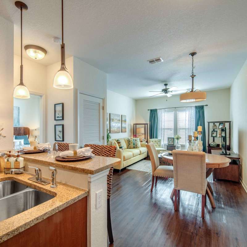 Wood-style flooring in a home at Goldelm at Bennett Park in Bradenton, Florida