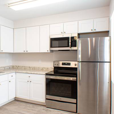 Kitchen area with hardwood flooring at Sand Pebble and Spanish Oaks in Sparks, Nevada