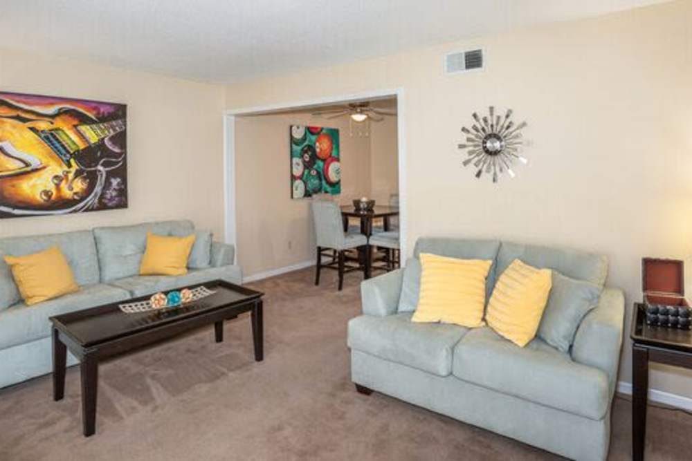 Well decorated living room with beautiful wall painting at Tiger Village in Columbia, Missouri