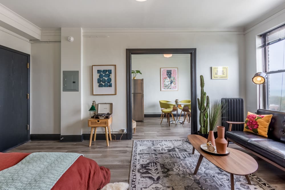 Bed and living room area at The Vivian in Chicago, Illinois