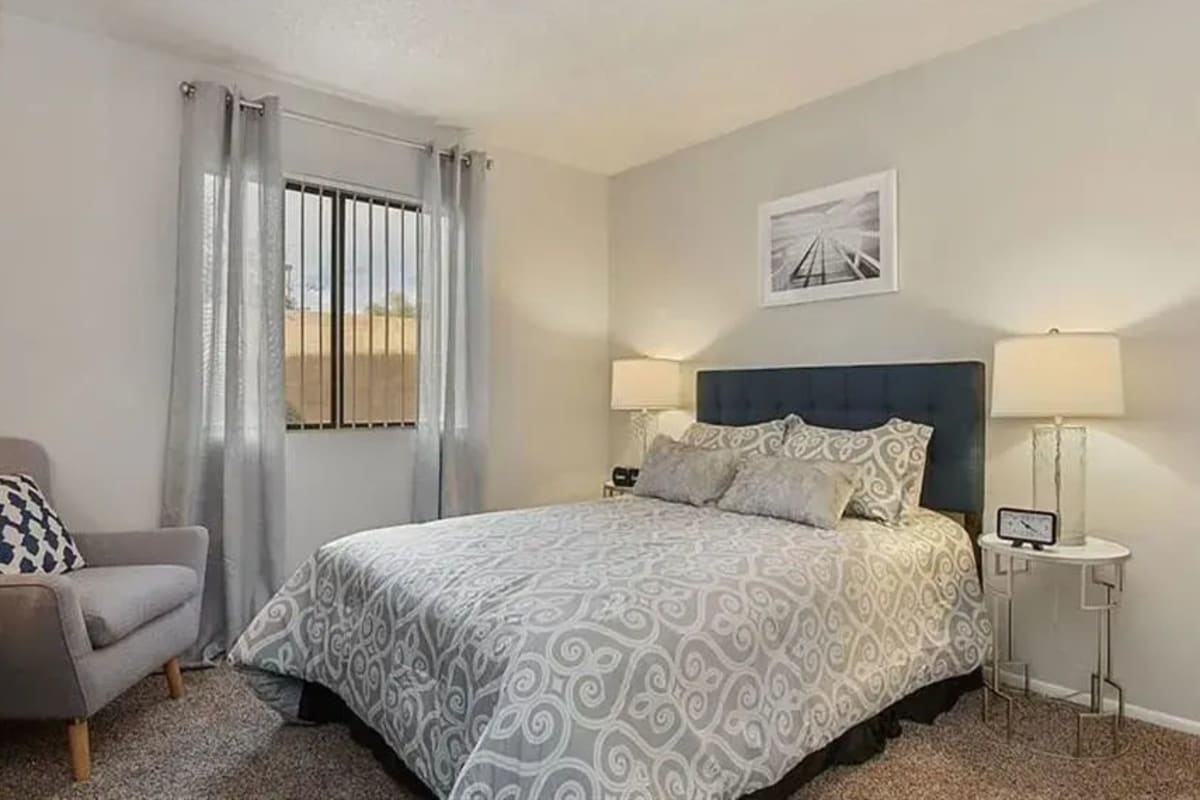 Furnished bedroom at Mesa Station Apartments in Mesa, Arizona