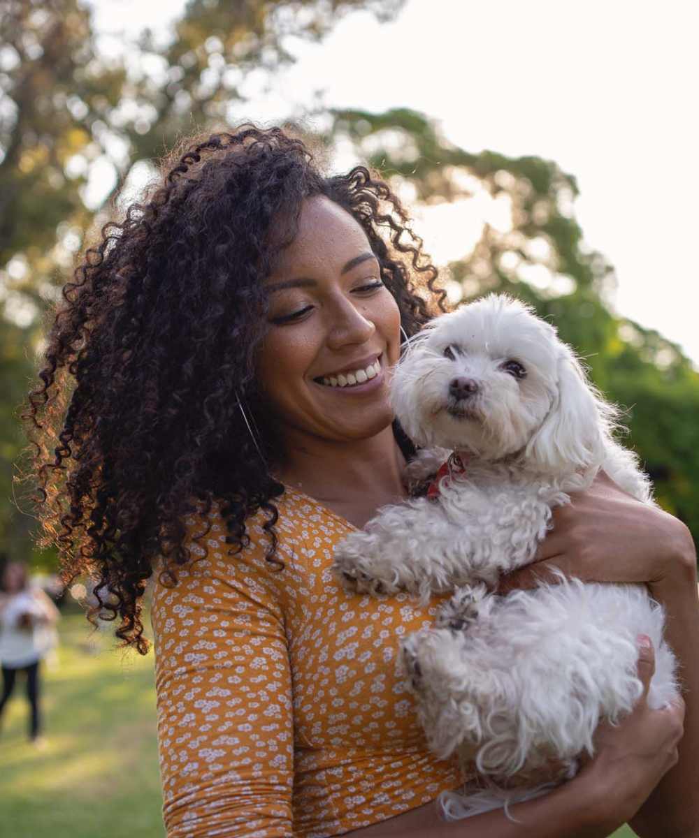 Gal with dog near Stonecrest Apartments in Spokane, Washington