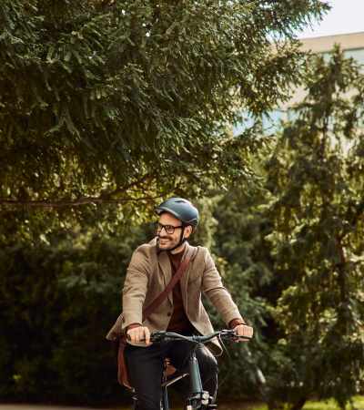 Man riding a bicycle at Stonehurst Manor and Harrison Court in Upper Darby Township, Pennsylvania