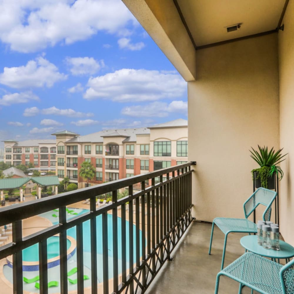 Private balcony overlooking the pool at Imperial Lofts in Sugar Land, Texas