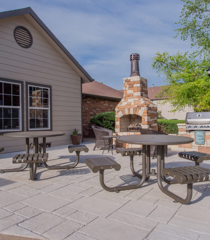 Fireplace seating outside of Huntington Park Apartments in Wichita, Kansas