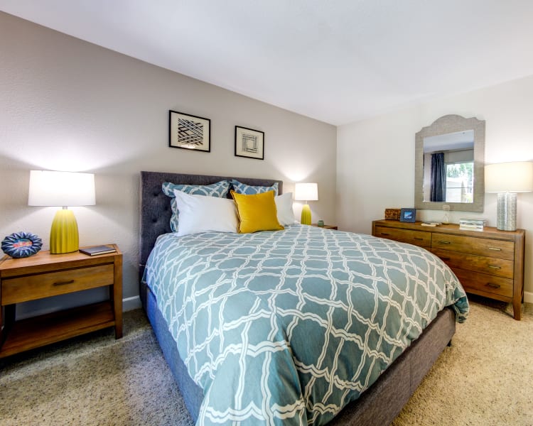 Well-furnished master bedroom in a model home at Sofi Sunnyvale in Sunnyvale, California