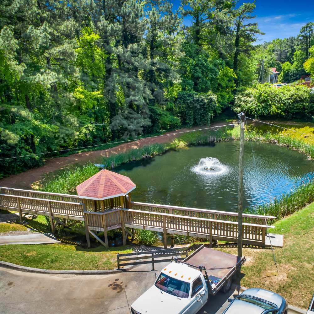 A view of the bridge and the pond at Park Canyon in Dalton, Georgia