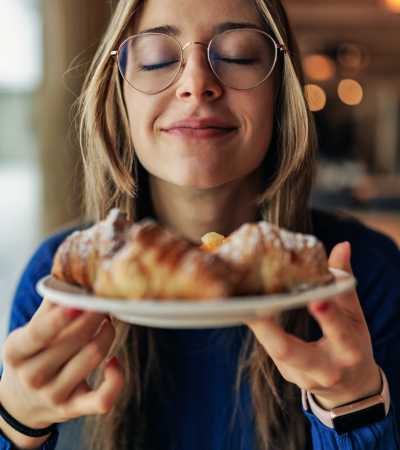 Person enjoying the food at Pleasant View Townhomes in Baltimore, Maryland